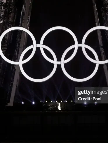 Canadian singer Celine Dion performs on the Eiffel Tower during the opening ceremony of the Paris 2024 Olympic Games in Paris on July 26, 2024. (Photo by Ludovic Marin - Pool/Getty Images)